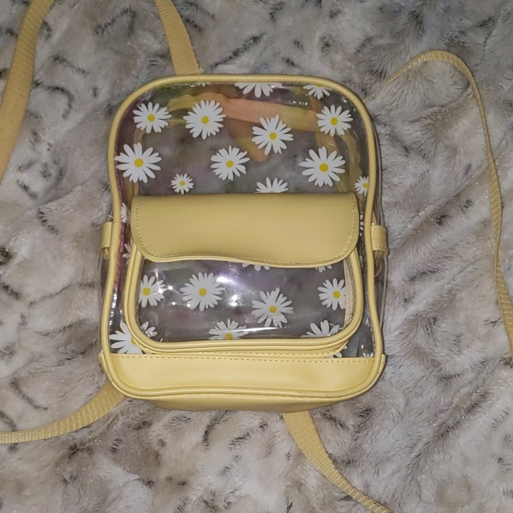 A daisy see-through mini backpack